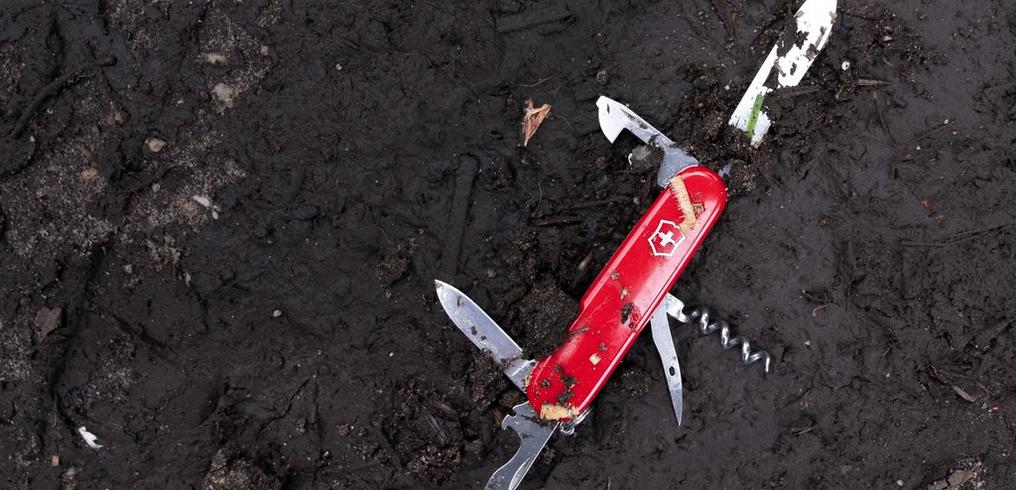 How do you clean a Swiss army knife?