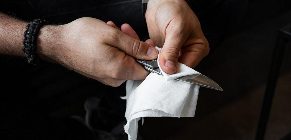 How do you maintain a pocket knife without taking it apart?