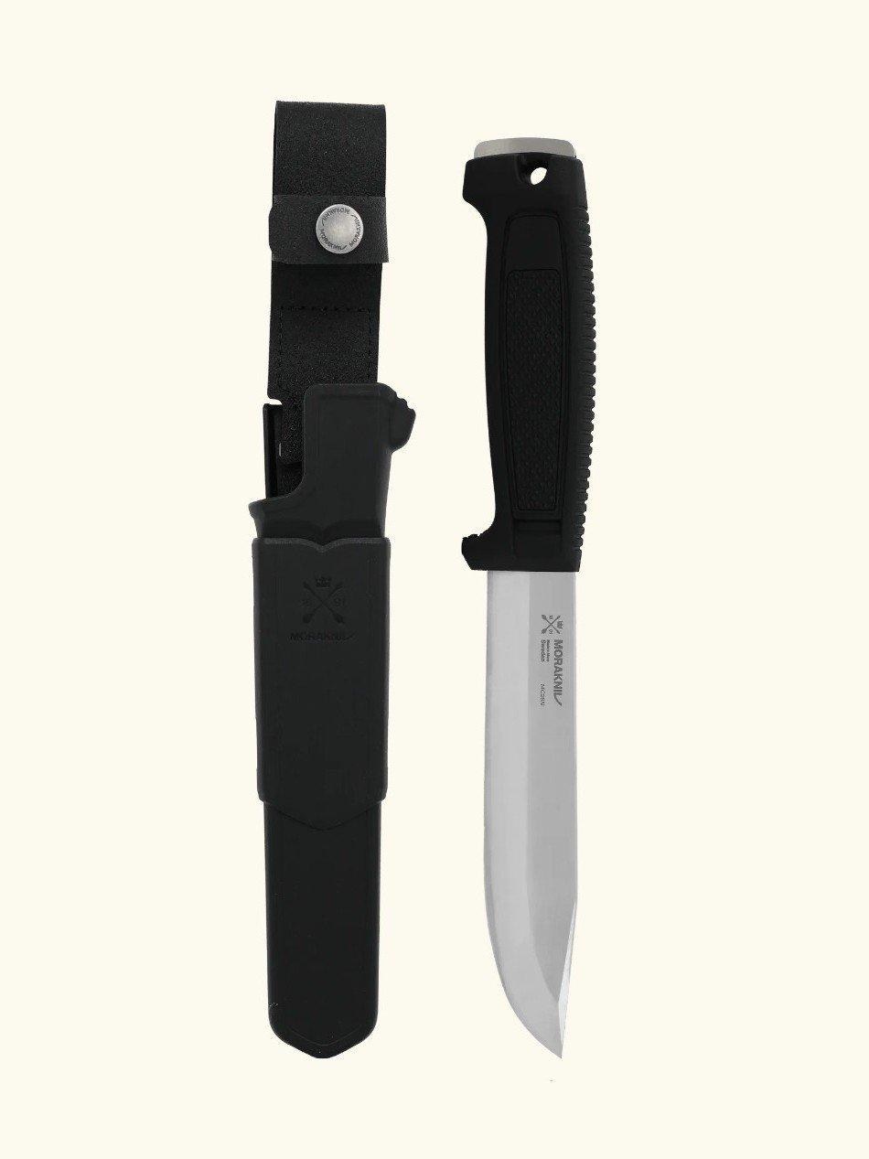 Morakniv Mörkret (S) survivalmes met roestvaststalen lemmet naast de schede