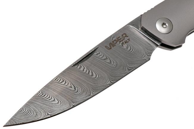 Fancy Drop point Damascus folding knife.