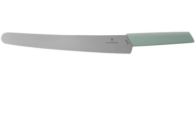 Couteau avec lame de scie avec ustensile de cuisine manche vert