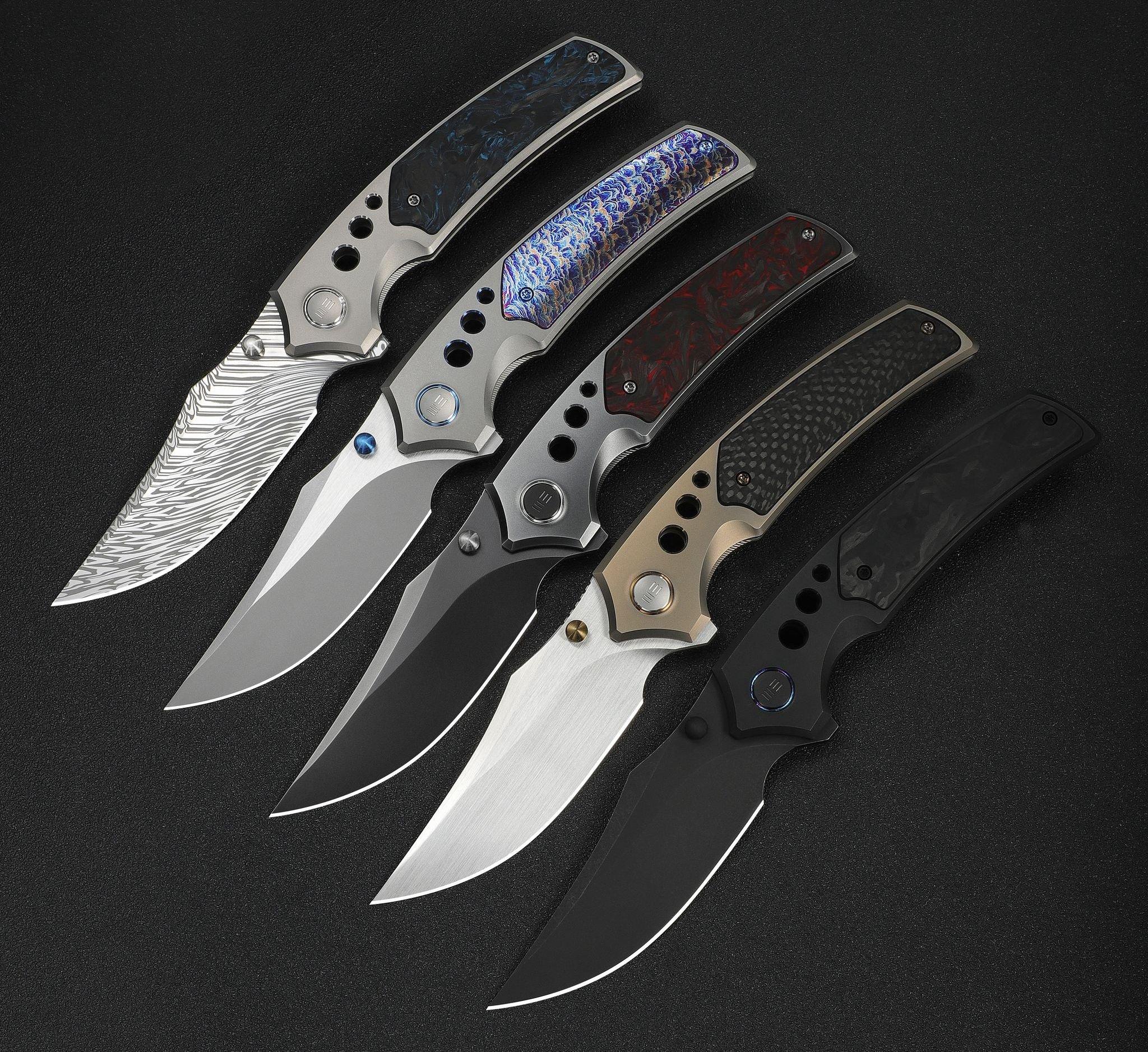 Five WE Knife Skynix pocket knives on a black background.