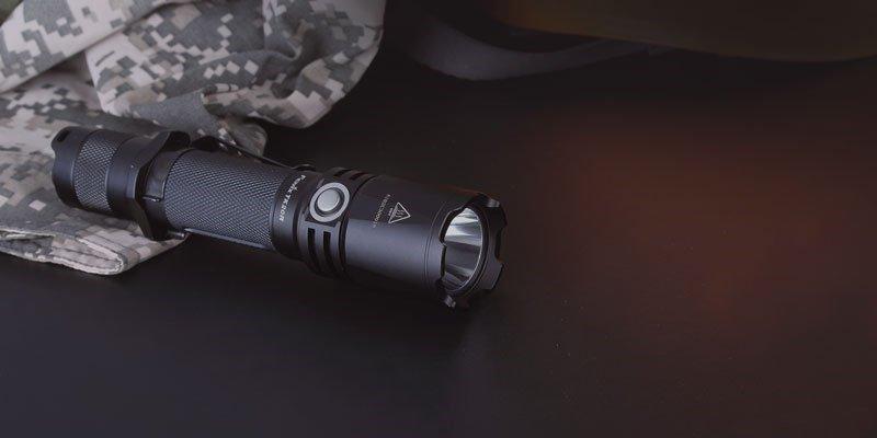 An unlit torch resting on a table