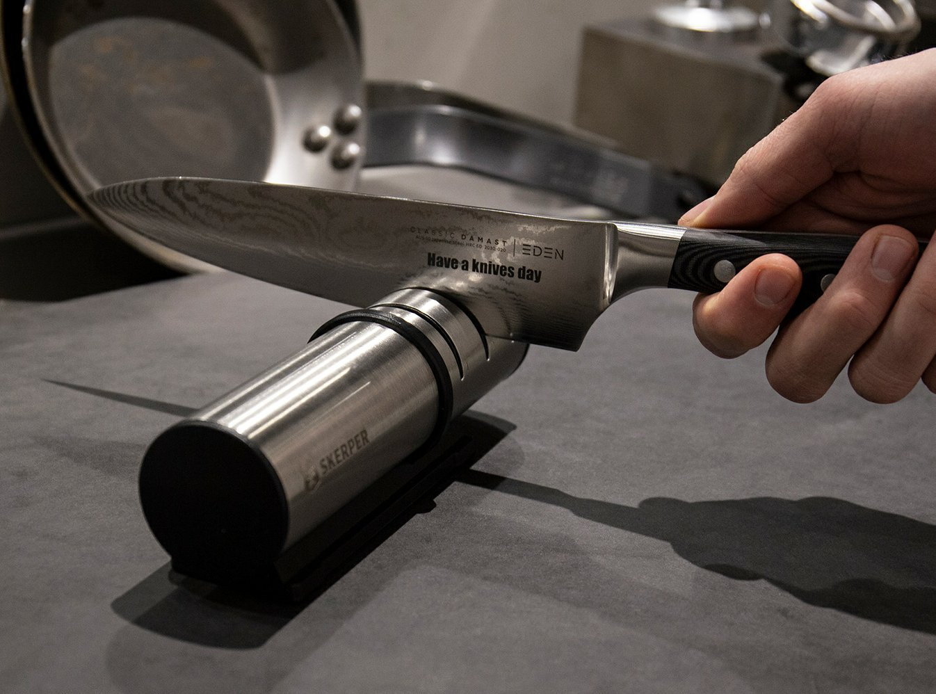 Pull-through knife sharpener use